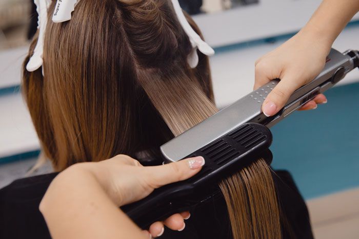 Up to shoulder temporary hair pressing and flat iron straightening at The Golden Street Salon the best hair services in hoshiarpur
