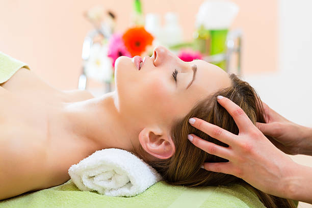 Relaxing therapeutic head massage service at The Golden Street Salon the best hair services in hoshiarpur